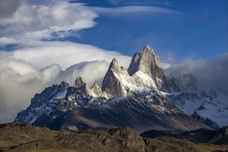 Argentina, Santa Cruz, El Chalten, Clouds above snow covered Mount Fitz Roy, El Chalten, Santa