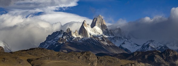 Argentina, Santa Cruz, El Chalten, Clouds above snow covered Mount Fitz Roy, El Chalten, Santa