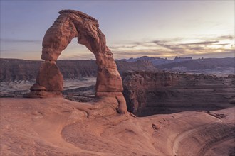 USA, Utah, Arches National Park, Delicate Arch in Arches National Park at sunset, Arches National