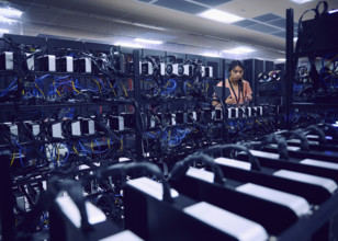 Female technician working in server room 
St, George, Utah, USA