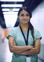 Portrait of smiling female technician in server room 
St, George, Utah, USA