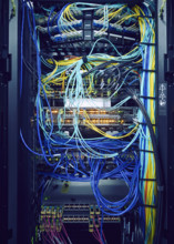 Close-up of hard drives and tangled cables in data center
St, George, Utah, USA