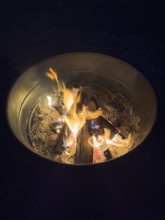 High angle view of campfire in metal fire pit at night
Fairview, Tennessee, USA