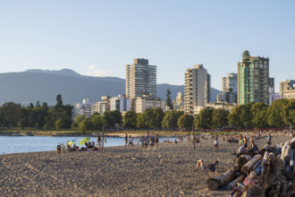 People on beach with high rise apartment buildings in background
Vancouver, British Columbia,