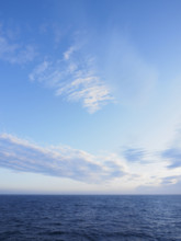 Wispy clouds above sea
Unga Village, Alaska, USA