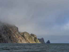 Storm clouds covering rocky coast
St Matthew Island, Alaska, USA