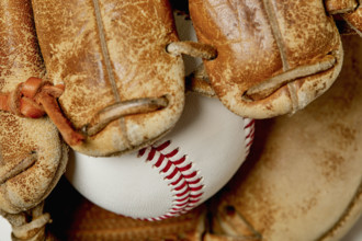 Close-up of baseball mitt with hard ball
New York City, NY USA