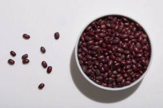 Overhead view of bowl of kidney bean on white background
New York City, NY USA