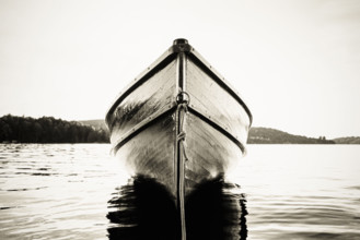 Wood boat anchored on Upper Saranac Lake, black and white
Saranac Lake, New York, USA