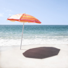 Lone orange beach umbrella on empty Surfside Beach
Nantucket, Massachusetts, USA