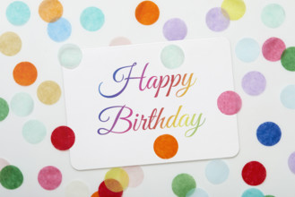 Happy Birthday sign on colorful confetti background
New York City, New York State, USA