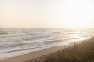 Sun setting over calm ocean and Cisco Beach
Nantucket, Massachusetts USA