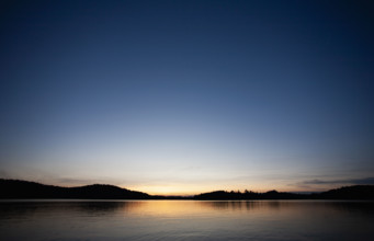 Sunset at calm Upper Saranac Lake
Santa Clara, New York, USA