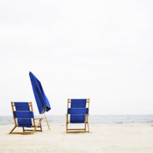 Blue beach chairs and folded beach umbrella at Spring Lake
Spring Lake, New Jersey, USA