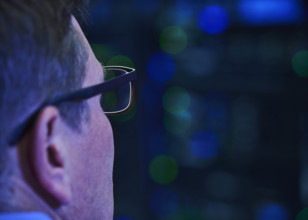 Close-up of man working in data center