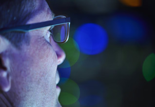 Close-up of man working in data center