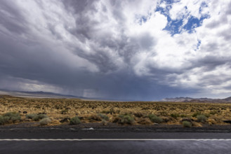 USA, Nevada, Winnemucca, Storm clouds over desert landscape