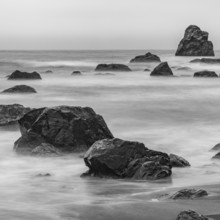 USA, Oregon, Brookings, Sea waves on rocky coast, long exposure, black and white