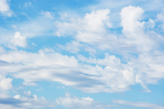 USA, Tennessee, Nashville, White puffy clouds on blue sky