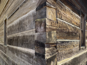 Close-up of dovetail joint on log cabin