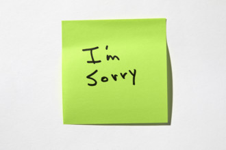 I'm Sorry on green post it note