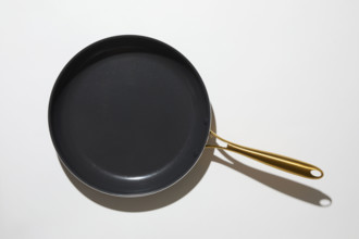 Torn blue glitter paper on white background