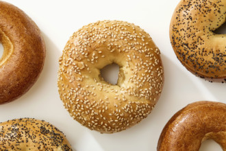 Overhead view of bagels on white background