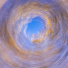 Low angle view of trees against sky motion blur