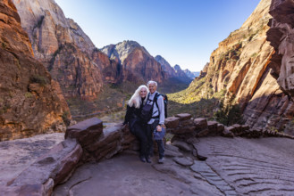 USA, Utah, Zion National Park, Portrait of senior couple on trail to Angels Landing