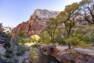 USA, Utah, Zion National Park, Virgin River and rock formations on sunny day