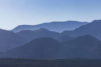 USA, Utah, LaVerkin, Silhouettes of mountain ranges against clear blue sky