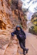 USA, Utah, Zion National Park, Portrait of smiling man on Angels Landing Trail