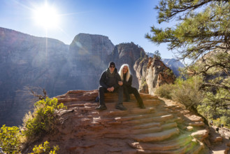 USA, Utah, Zion National Park, Portrait of senior couple at Scouts Lookout below Angels Landing