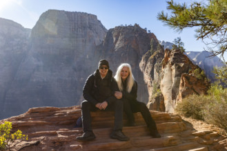 USA, Utah, Zion National Park, Portrait of senior couple at Scouts Lookout below Angels Landing