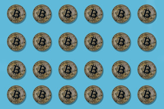 Multiple bitcoin on blue background