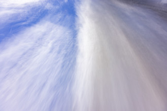 Intentional camera movement blur of snowy road