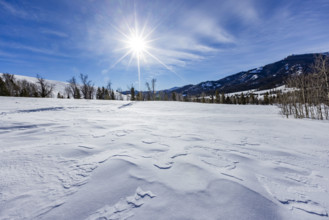 USA, Idaho, Sun Valley, Sun shining above winter landscape