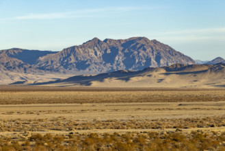 USA, California, Baker, Desert landscape with rocky mountain