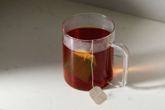 Cup of tea on kitchen counter. New York City, New York State, USA.