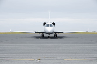 Private jet on airport tarmac. Nantucket, Massachusetts, USA.
