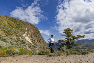 Portrait of smiling woman on Carbonate Mountain trail. Hailey, Idaho, USA.