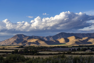White puffy clouds over mountains. Bellevue, Idaho, USA.