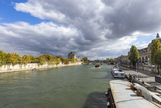 Thick clouds above Seine River. Paris, Ile de France, France.