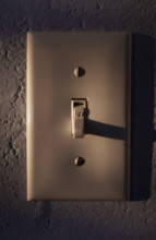 Close-up of light switch in off position. Nantucket, Massachusetts, USA.