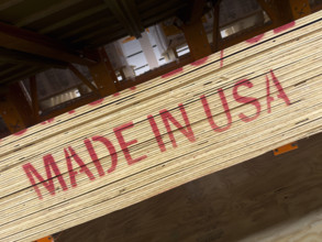 Made in USA printed on plywood stacked at lumber yard. Nashville, Tennessee, USA.