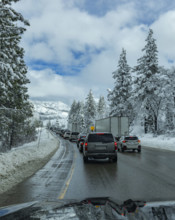 Traffic on highway in Winter seen from car, Truckee, California, USA.