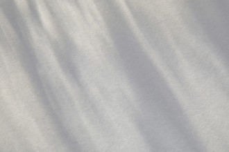 Light streaks on white background, New York City, New York, USA.