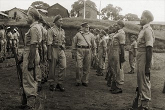 Colonel Magrane inspects a Fijian regiment. Colonel J P Magrane inspects a regiment of uniformed
