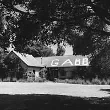 Gabb's house. A single storey house belonging to Gabb displays the large painted letters 'GABB' on