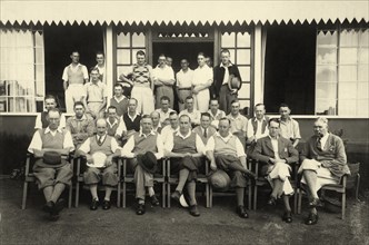 Railway golfers at Muthaiga Club. Informal outdoors portrait of a group of European men wearing